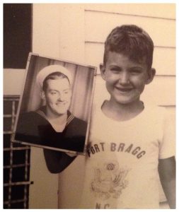 My husband Ralph's younger brother, Dan, holding his picture during the Vietnam War. 